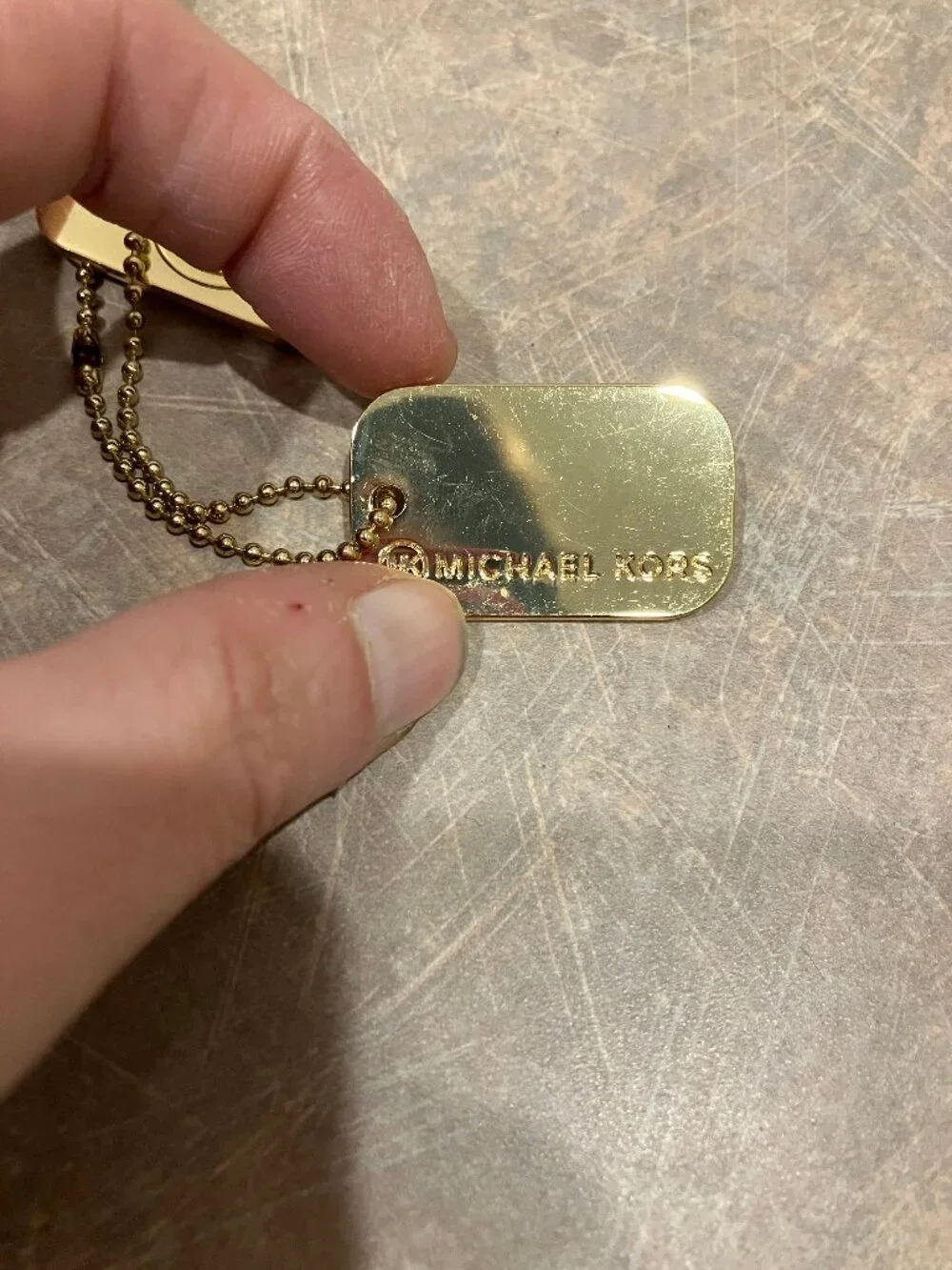 Gold Michael Kors Metal Bag Tag
